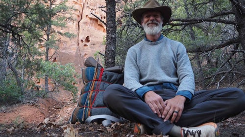 A man sitting in the forest