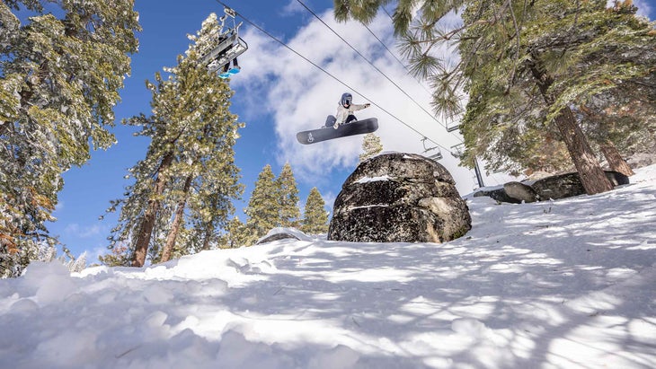 A woman snowboarding