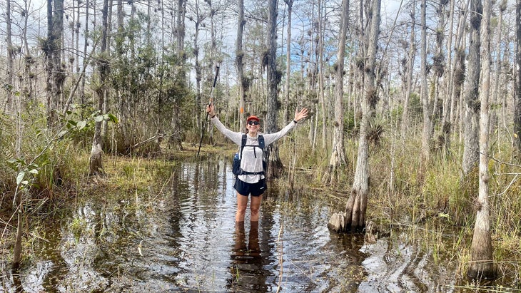 woman standing in swamp on the Florida Trail in Florida