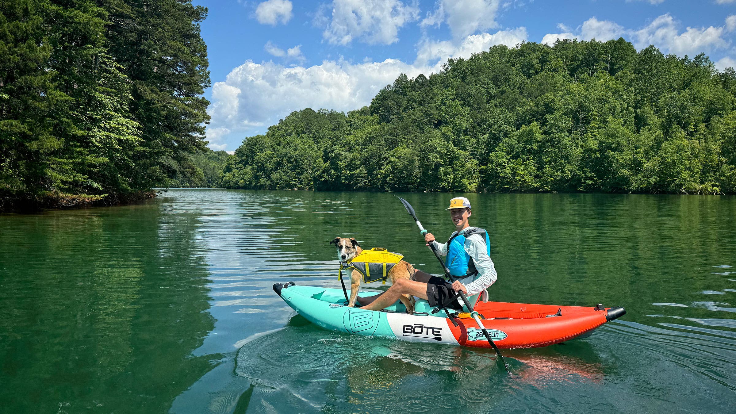 boy and dog paddle kayak on Fontana Lake