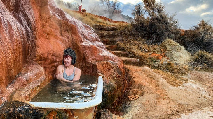 woman in tub at Mystic Hot Springs, Monroe, Utah.