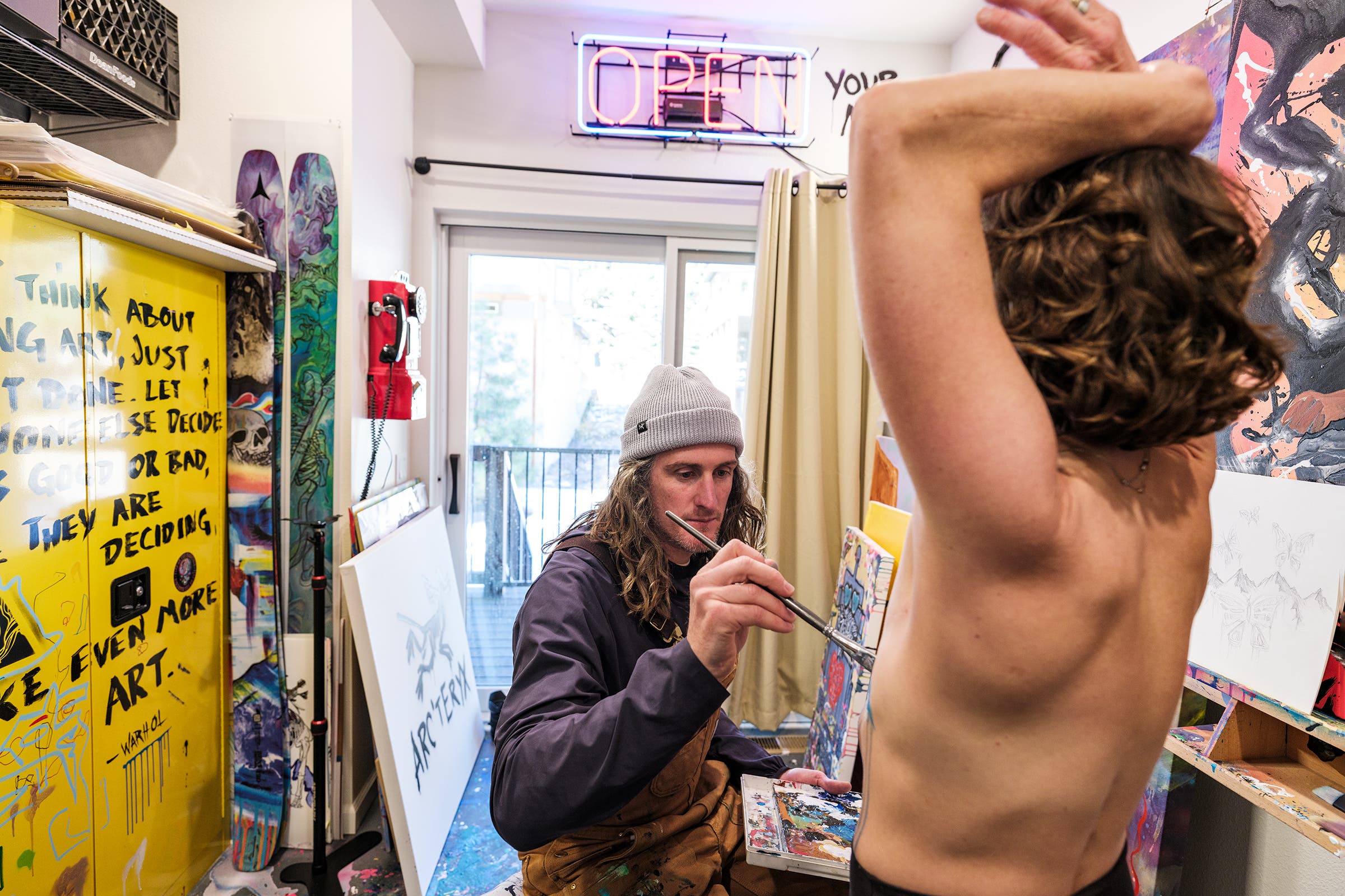 Chris and Kimmy during a body-painting session.