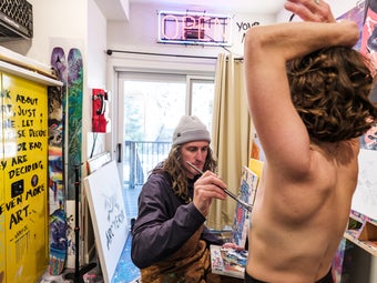 Chris and Kimmy during a body-painting session.