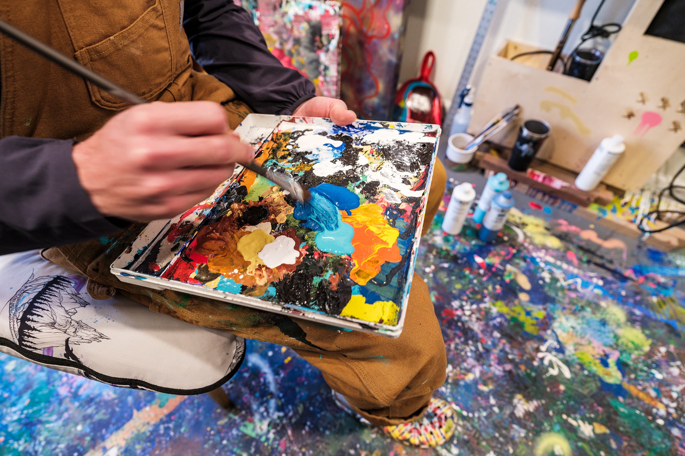 Chris and Kimmy during a body-painting session.