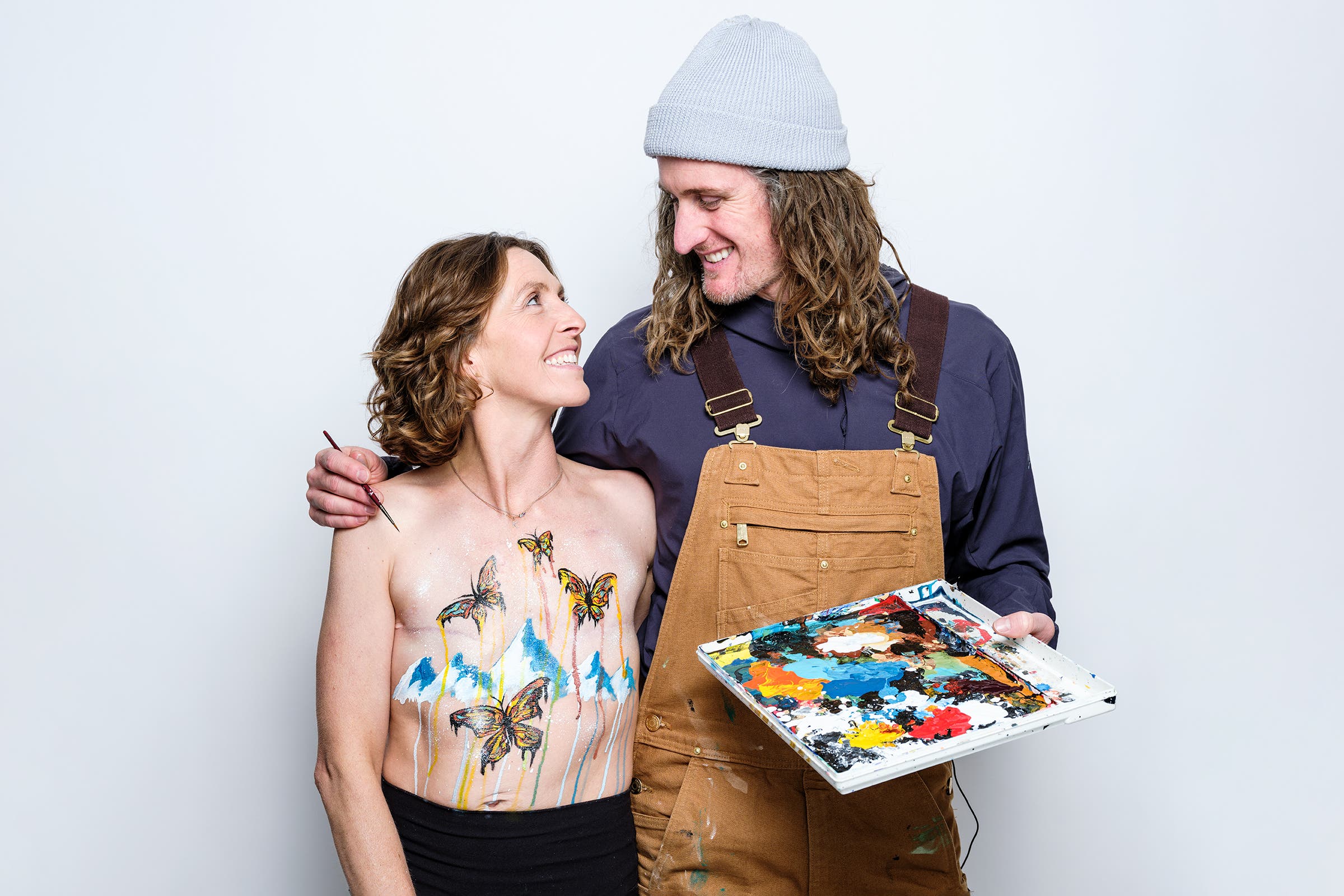 Chris and Kimmy during a body-painting session.