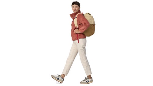 woman walking with Patagonia bakpack