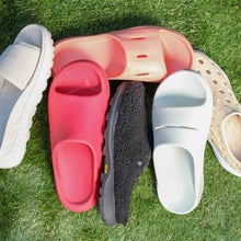 recovery sandals on grass
