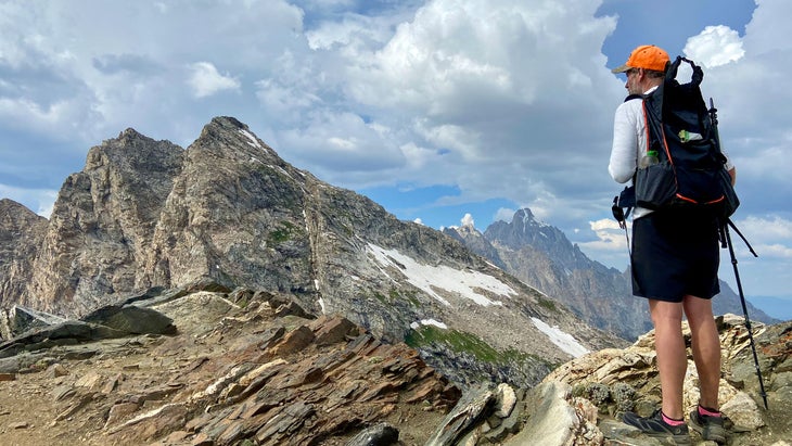 man hiking on teton crest trail, wyoming