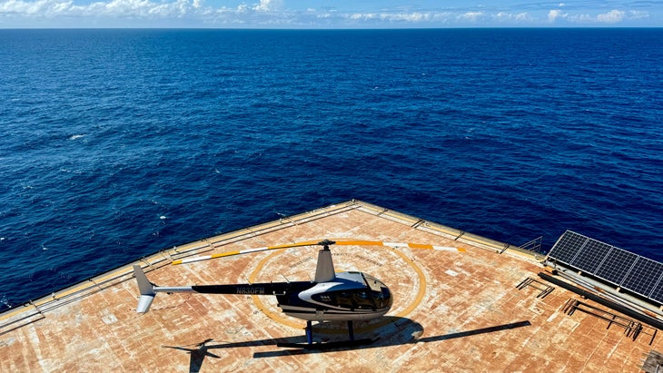 helicopter landing on deck at lighthouse