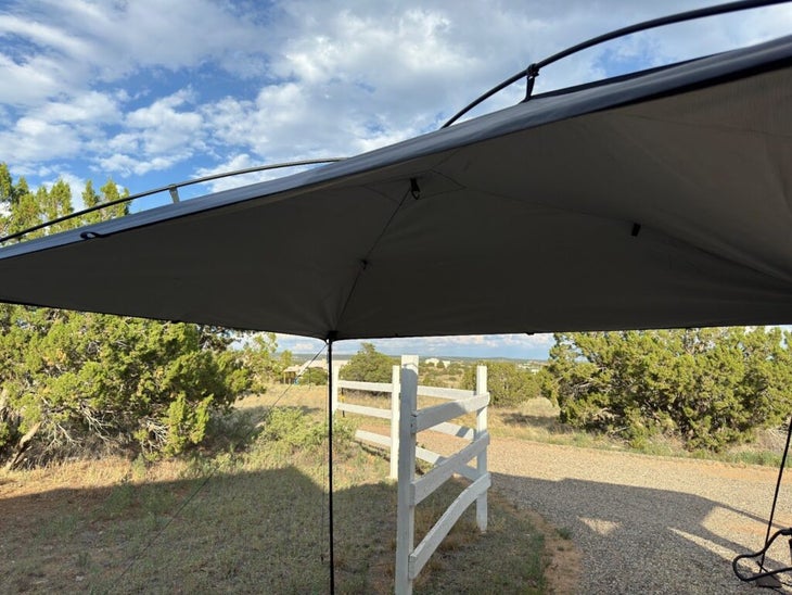 The MoonShade extends out from a truck or van, using telescoping poles.