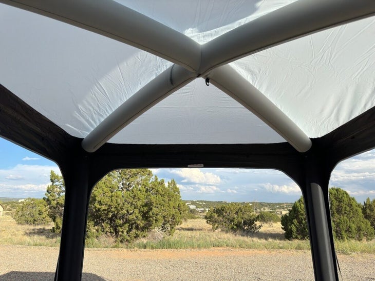 A Dometic Hub 2 REDUX inflatable awning for a truck or camper