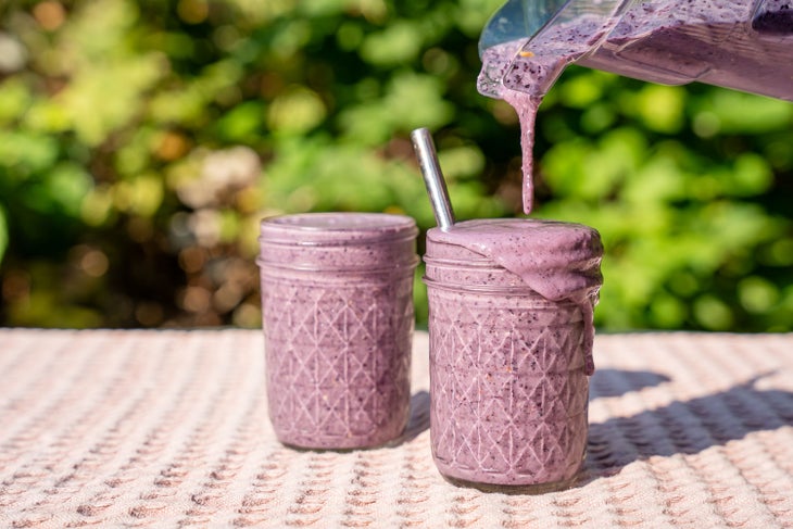 A Blueberry Muffin Smoothie With Whole Milk, Chia Seeds, Cinnamon, Peanut Butter, and Banana