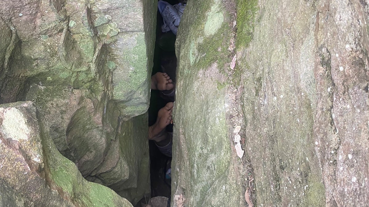 Would You Rather Be Stuck Between Rocks or Inside a Trailhead Toilet?