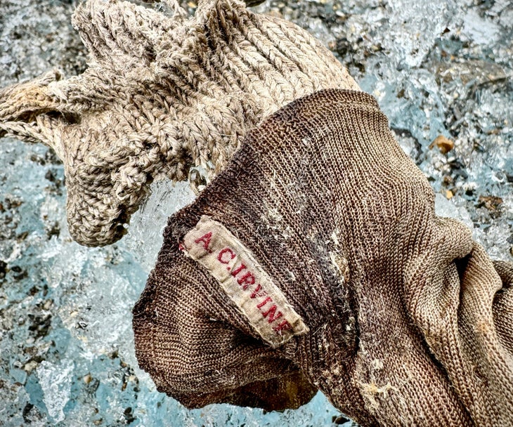 A close-up of the sock shows Irvine’s embroidered name