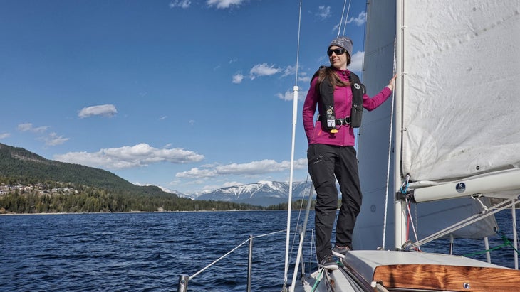 jayme moye sailing on her boat in nelson, british columbia