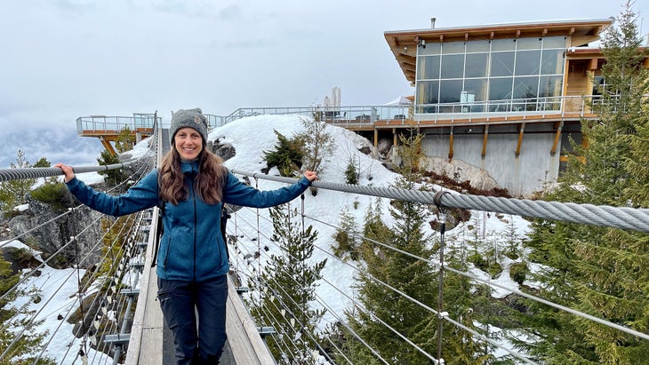 jayme moye at the top of the squamish gondola during winter in british columbia