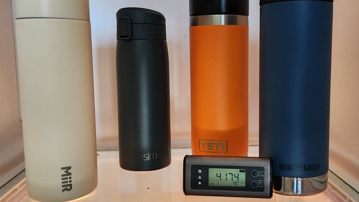 Travel mugs in fridge with thermometer