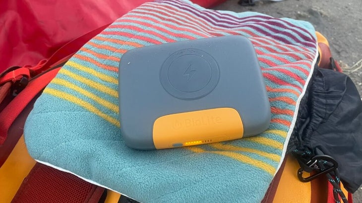 The BioLite Charge 100 Max rests atop a towel. It charges the author's laptop when he's on long outdoor trips.