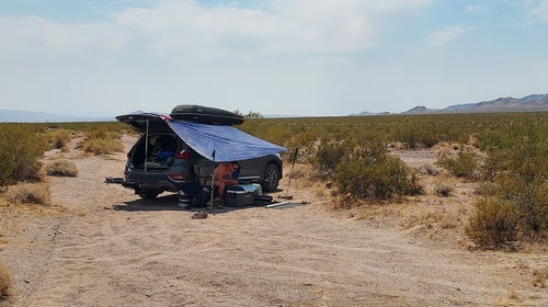 Leath Tonino camping in the heat