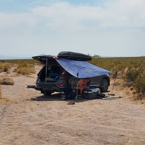 Leath Tonino camping in the heat