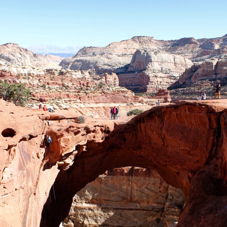 Hikers at Cassidy Arch, Capitol Reef National Parkl