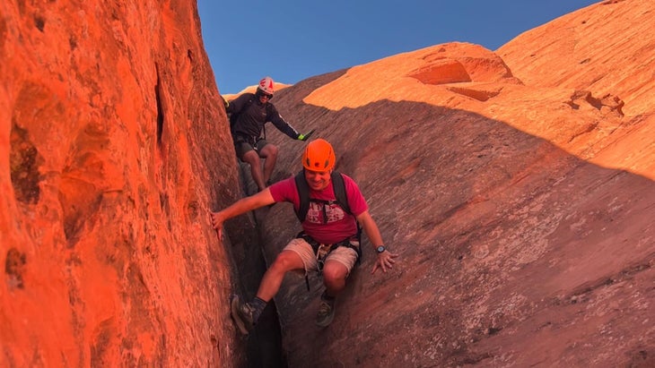 two people canyoneering in Capitol Reef