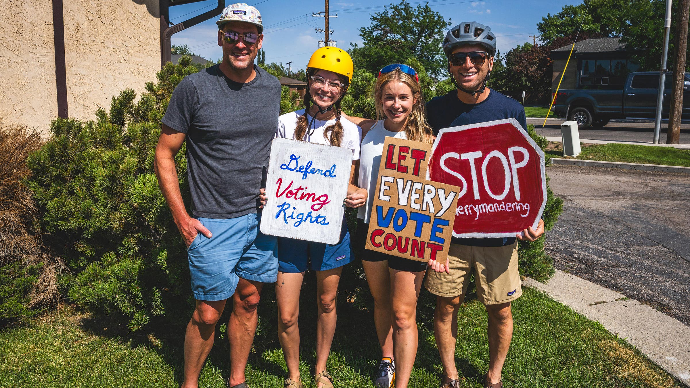 Rob Lea, Katie Boue, Caroline Gleich and Brody Leven post after the "Run to Redistrict," a fundraising walk/run Caroline organized to visit all four of Utah's Congressional districts in a 2 mile run through the heart of Salt Lake City to highlight the gerrymandering and raise funds for the lawsuit against the Utah State legislature.