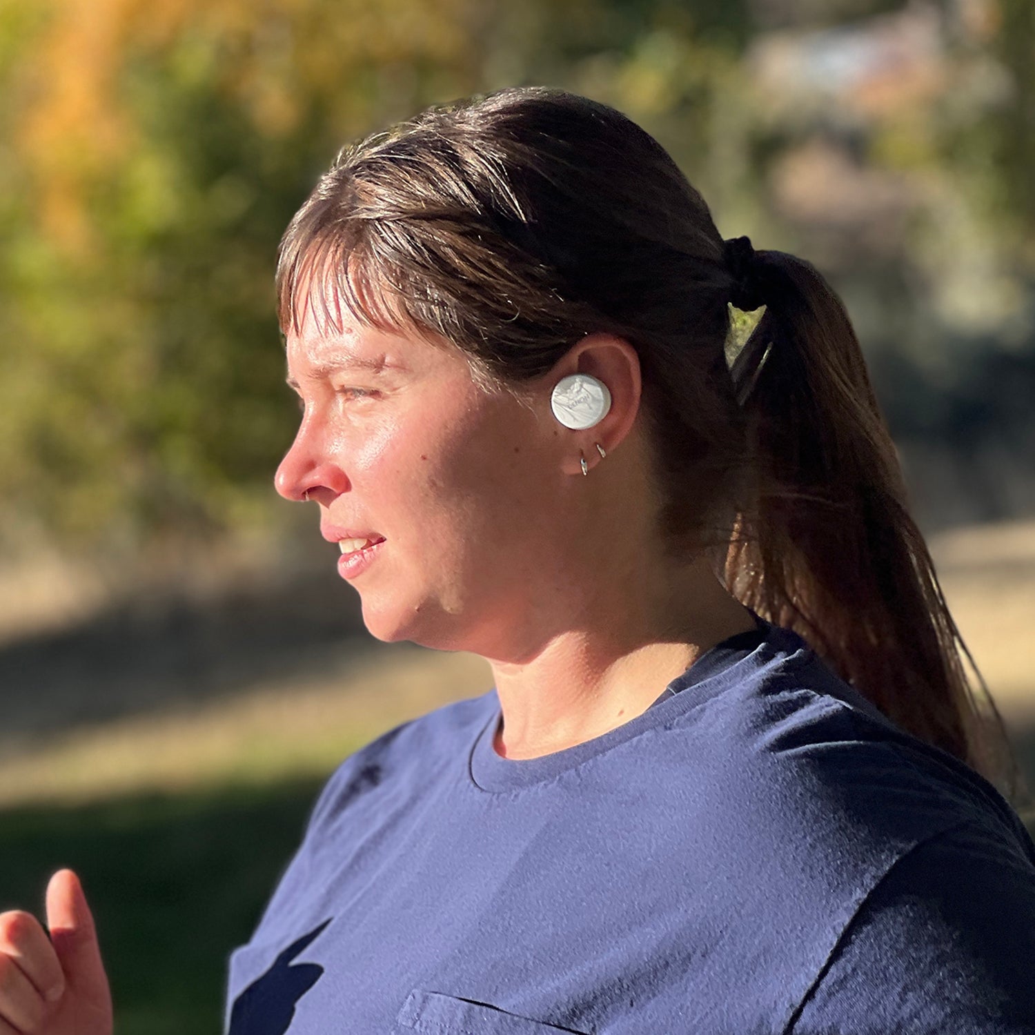 woman running with sport headphones