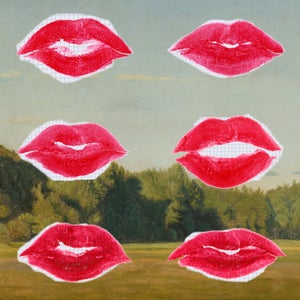 Floating lips on an outdoor background.