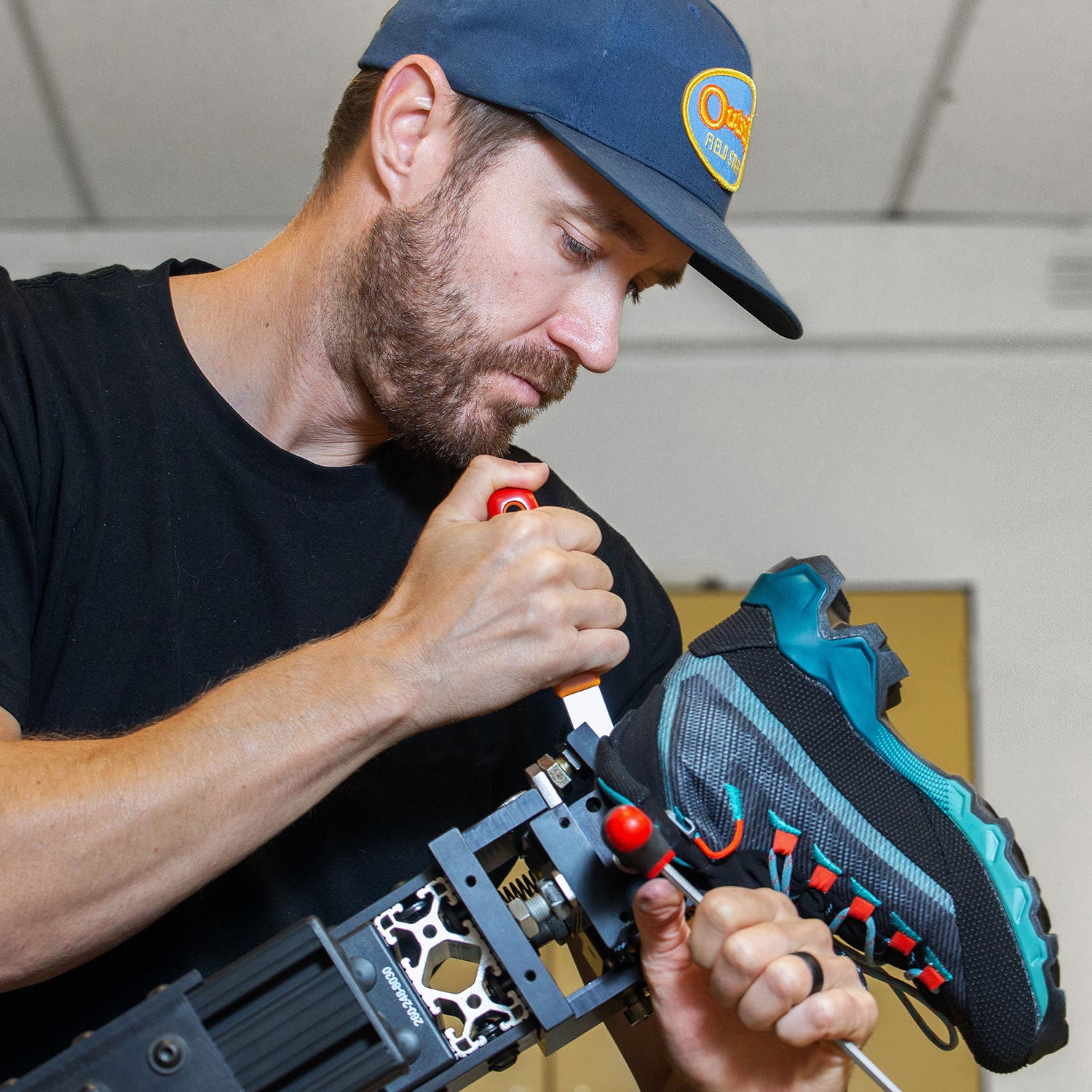 Adam Trenkamp adjusts the Time Machine for a hiking boot test