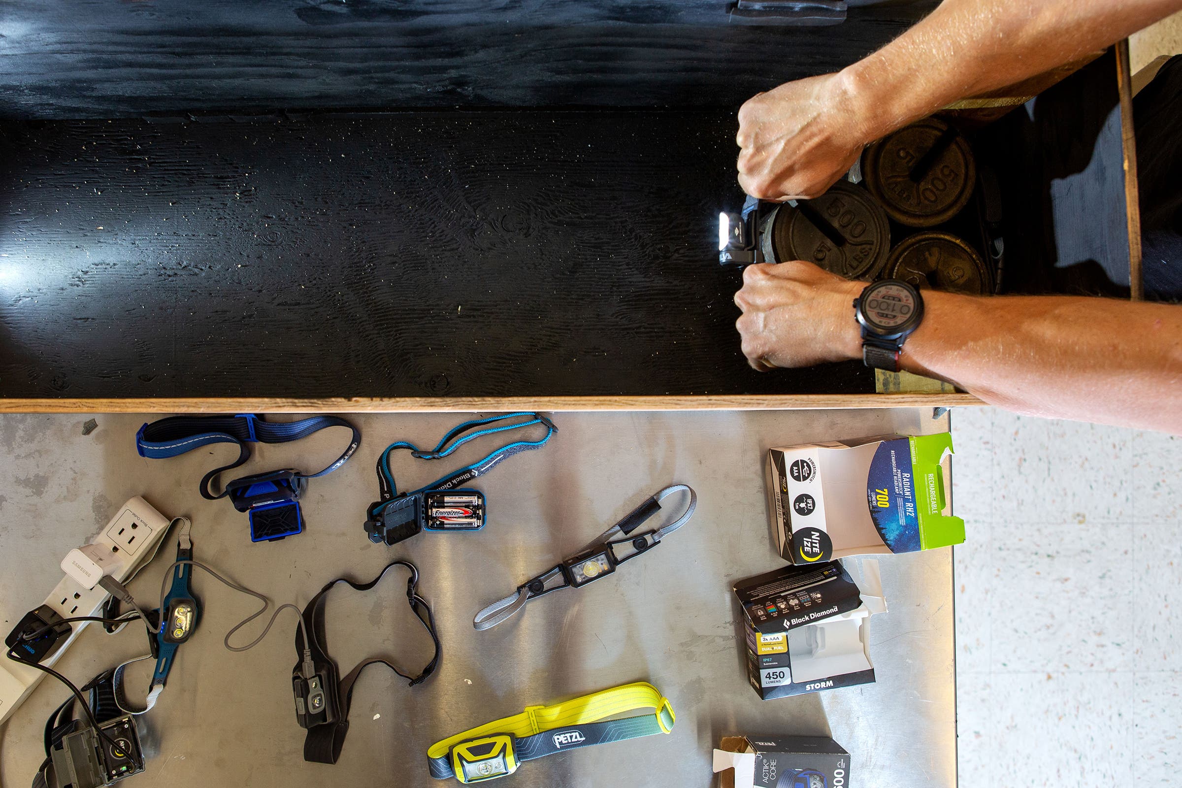 Trenkamp sets up an experiment to test lux output of various headlamps