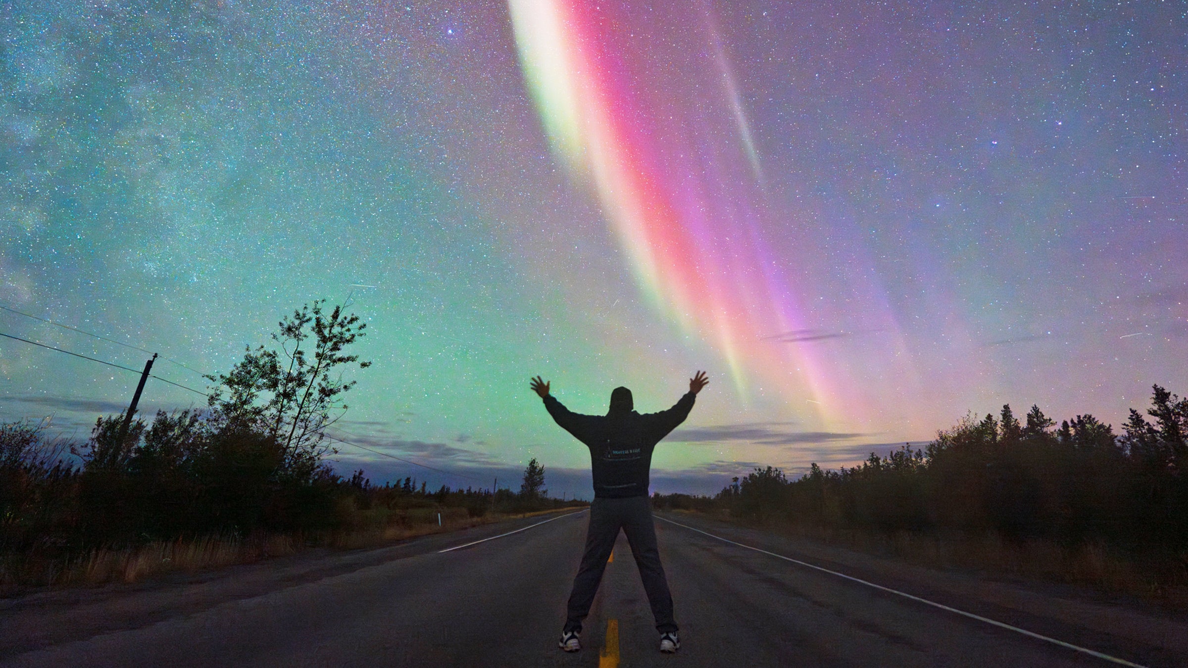 Joe Buffalo Child rejoices at seeing the northern lights dance in the sky above Yellowknife, in Canada’s Northwest Territories.