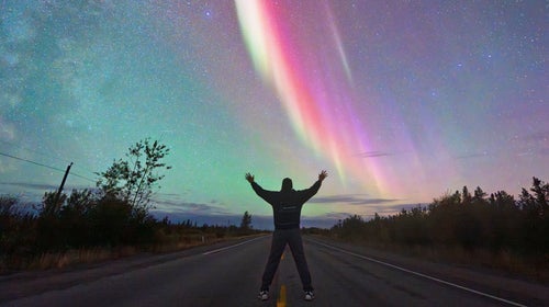 Joe Buffalo Child rejoices at seeing the northern lights dance in the sky above Yellowknife, in Canada’s Northwest Territories.