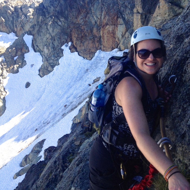 kathleen rellihan climbing her first via ferrata on whistler peak