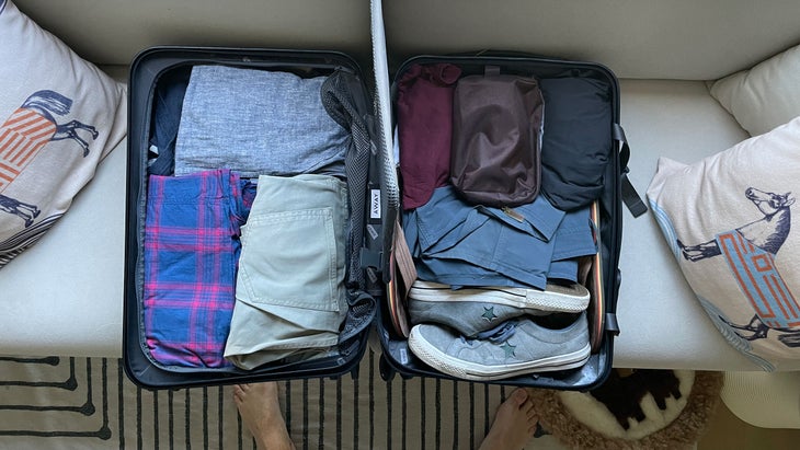 Ryan Krogh's suitcase packed with rolled up clothing