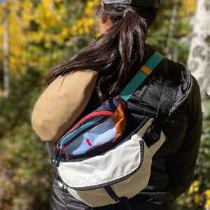 three sling bags on woman's shoulder