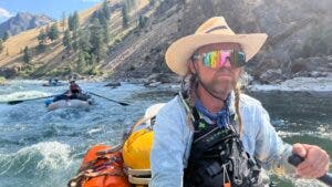 paddling a boat down a river