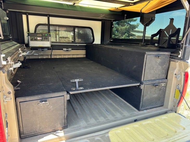 Basecamp storage setup with the optional bed platform deployed