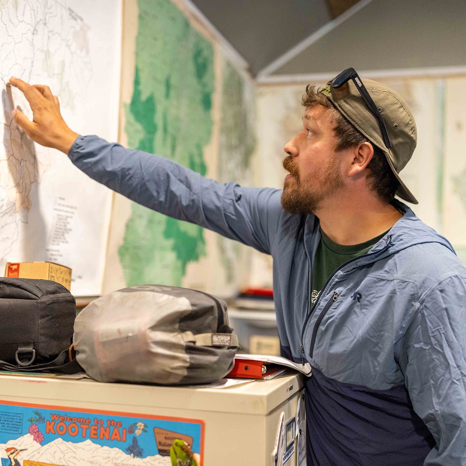 Anthony South, Headwaters Director for YVFCl, points out the Black Ram project area on a map.