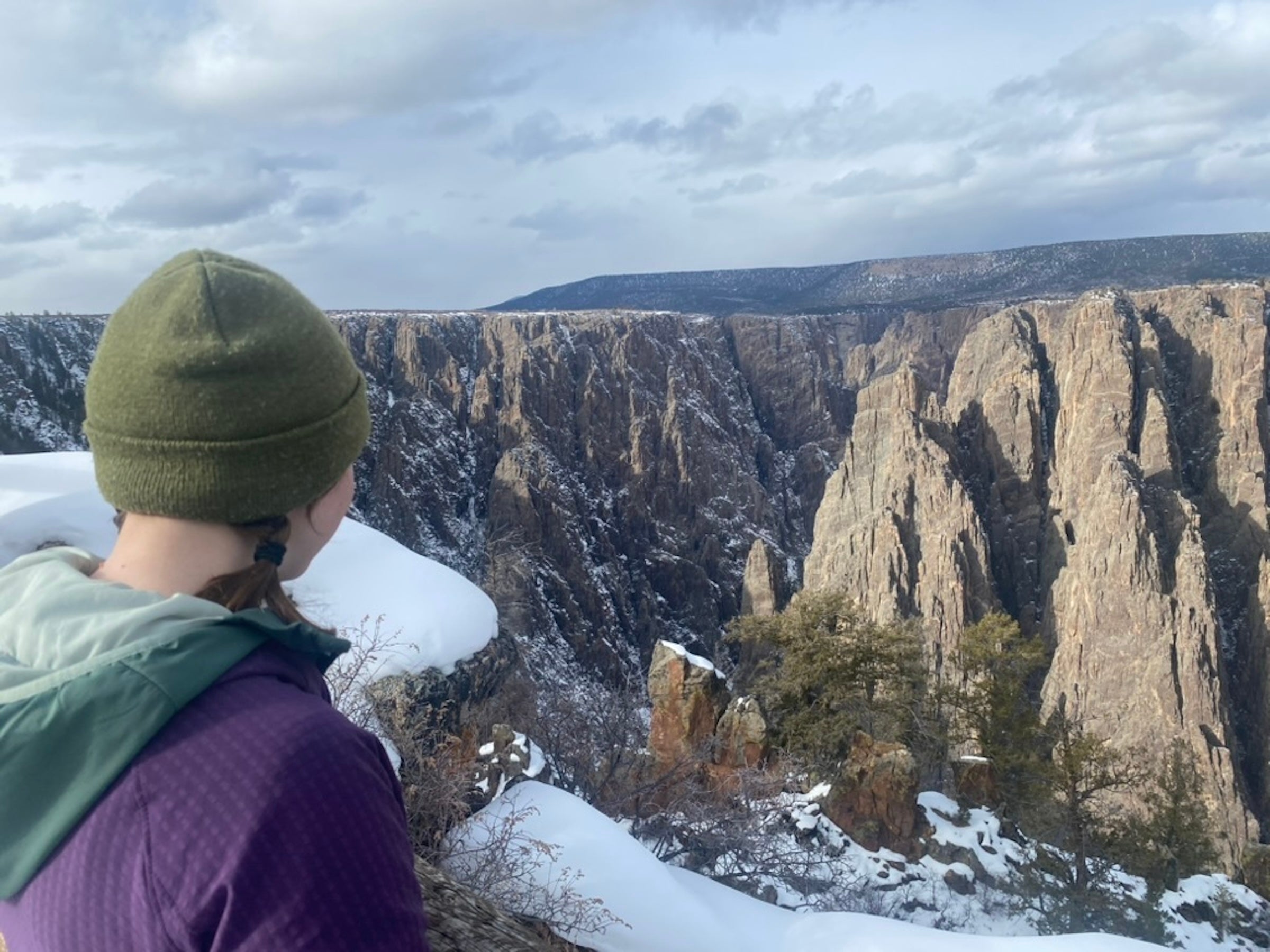 woman standing along black canyon hikes