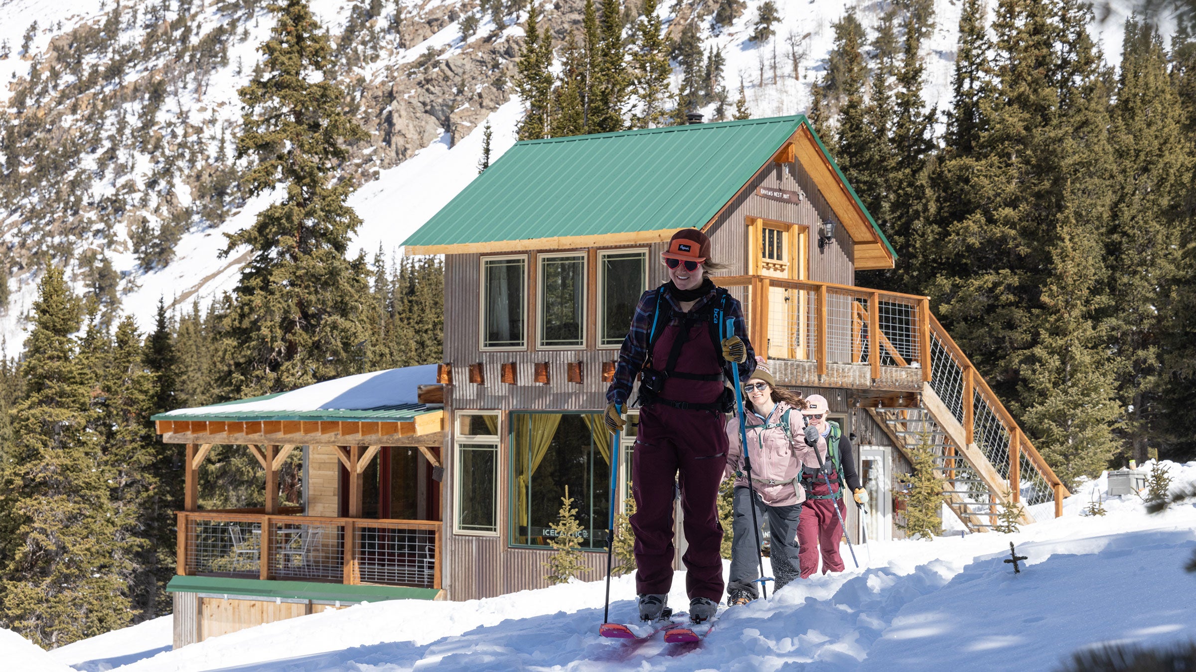 women skiing outside of raven's nest: the coolest airbnb in colorado