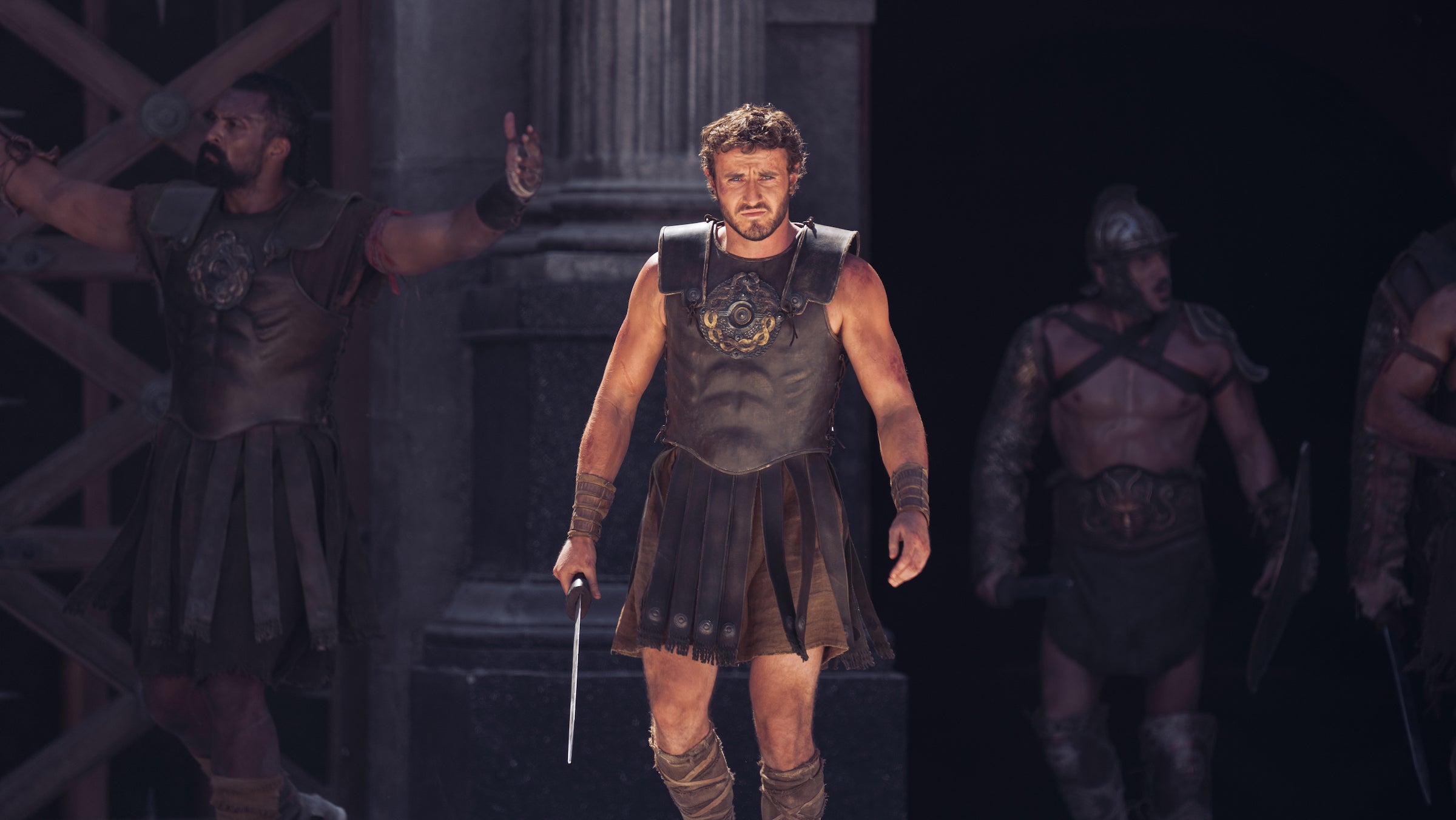 Paul Mescal walking, dressed as a gladiator