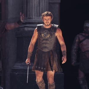 Paul Mescal walking, dressed as a gladiator