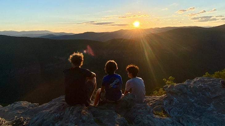 A group with a sunset view at Falling Creek Camp 50 Best Places to Work 