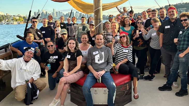 Geocaching HQ workers on a boat