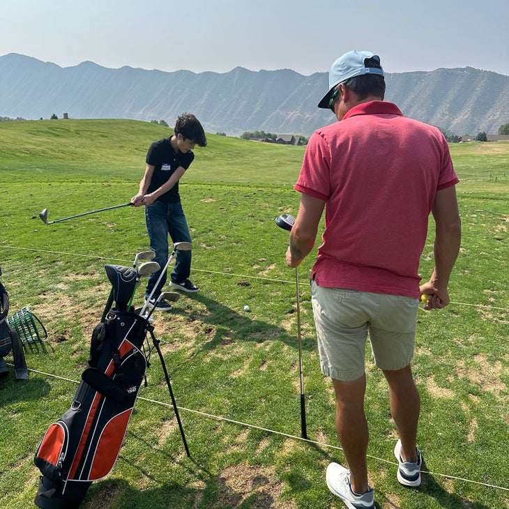 teenager learning golf in Colorado