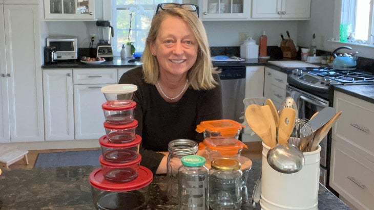 The author in her kitchen surrounded by her glass containers and non-plastic utensils