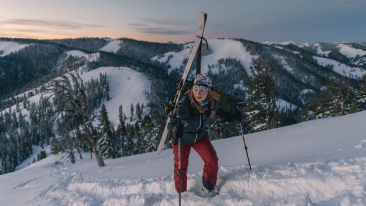 woman skier hiking uphill, Teton Pass, near Jackson, Wyoming