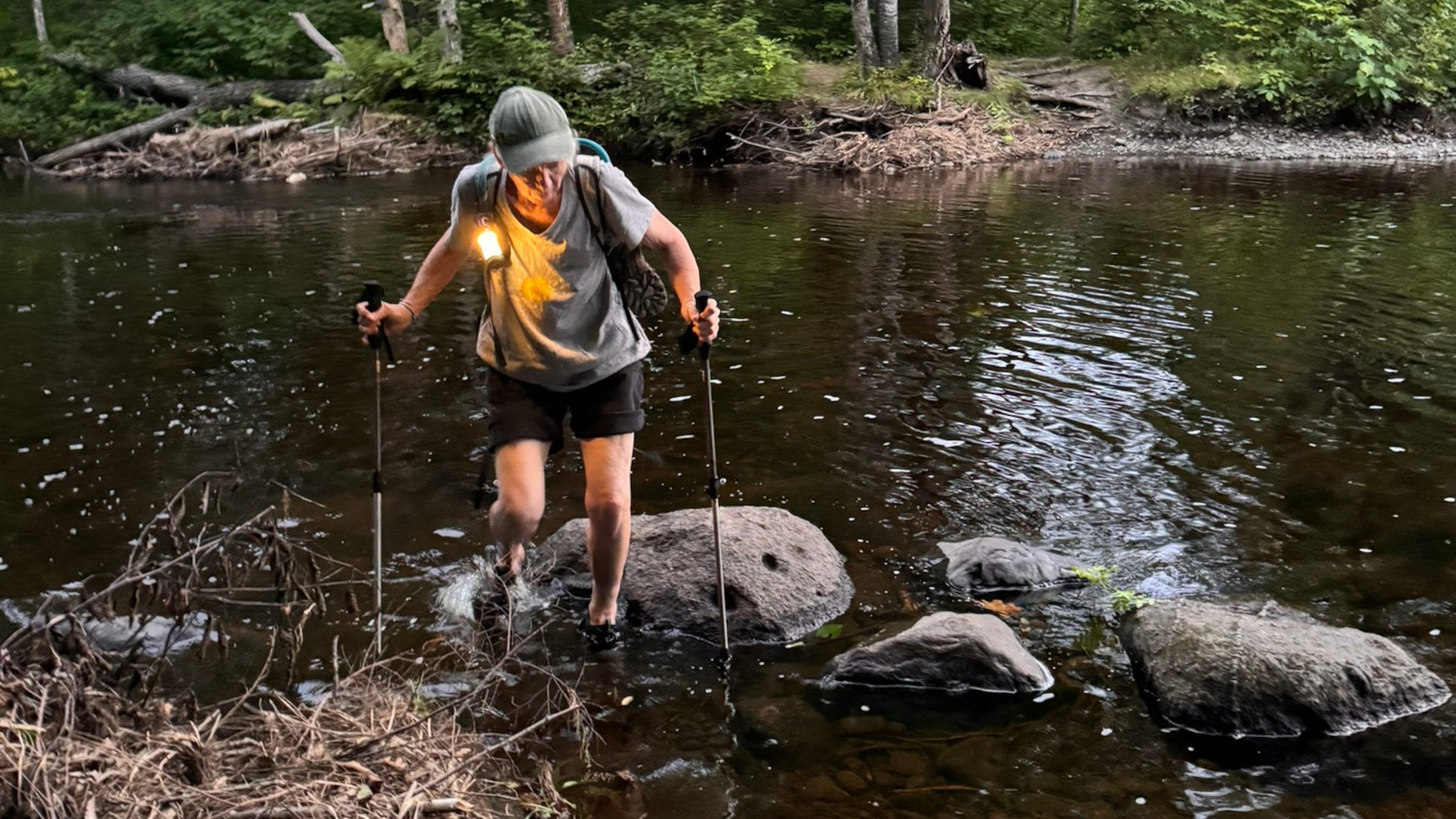 Linda crossing a river