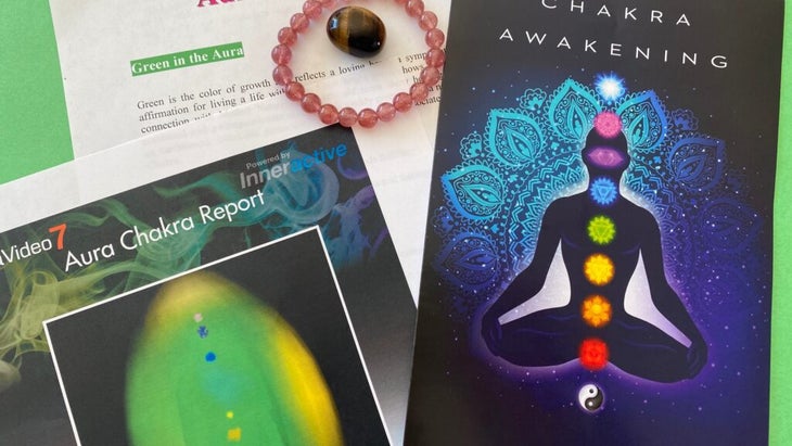 A quartz bracelet, tiger eye stone, and brochure and report on the author's chakras.